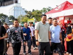 Bobby Nasution Tarik kupon Undian Acara Fun Walk dengan Menyumbang 5 Sepeda